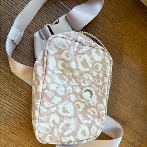 Cream Crossbody Bag with Pattern and Structured Shape